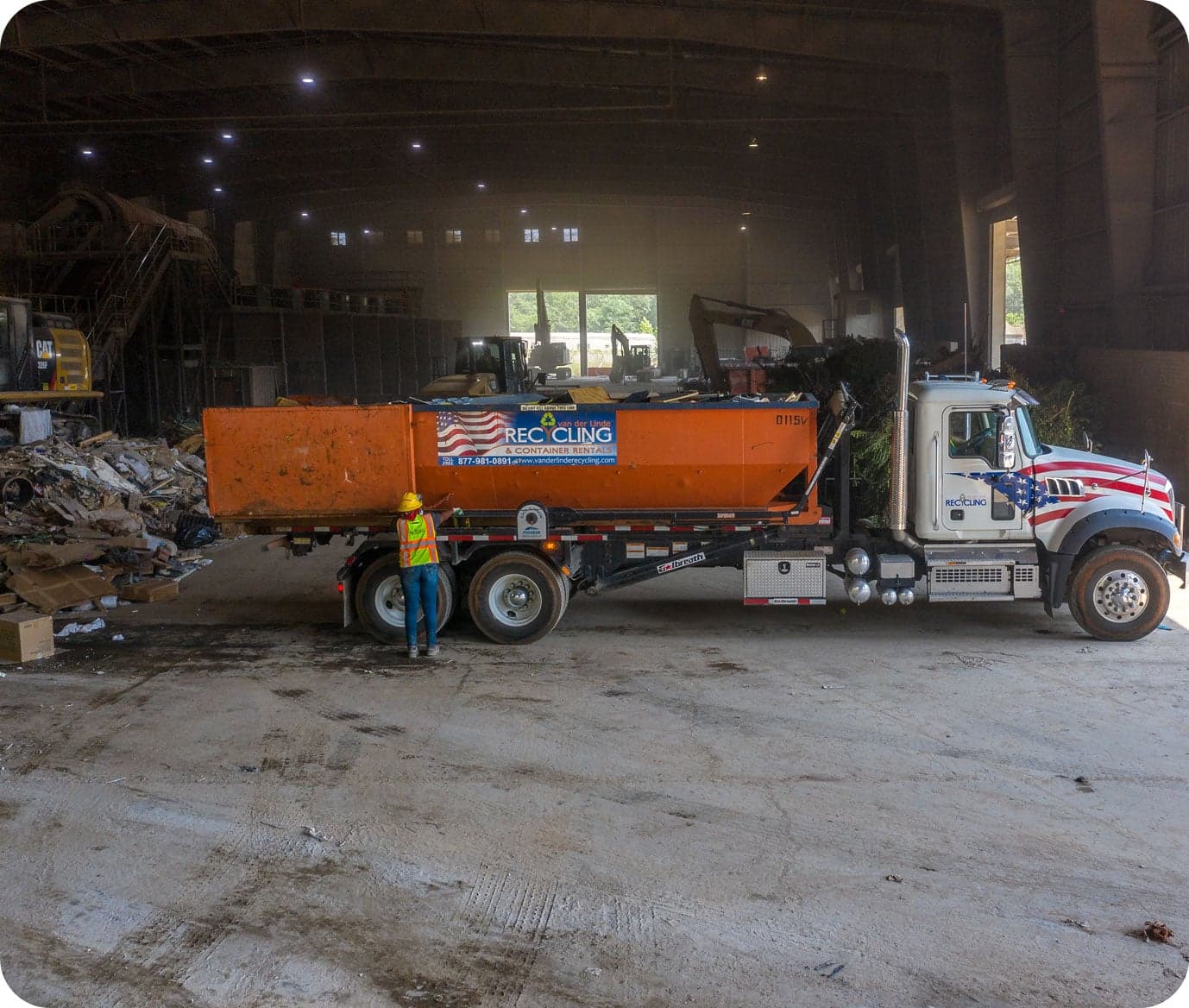 van der Linde Recycling 20-yard roll-off container on a job site